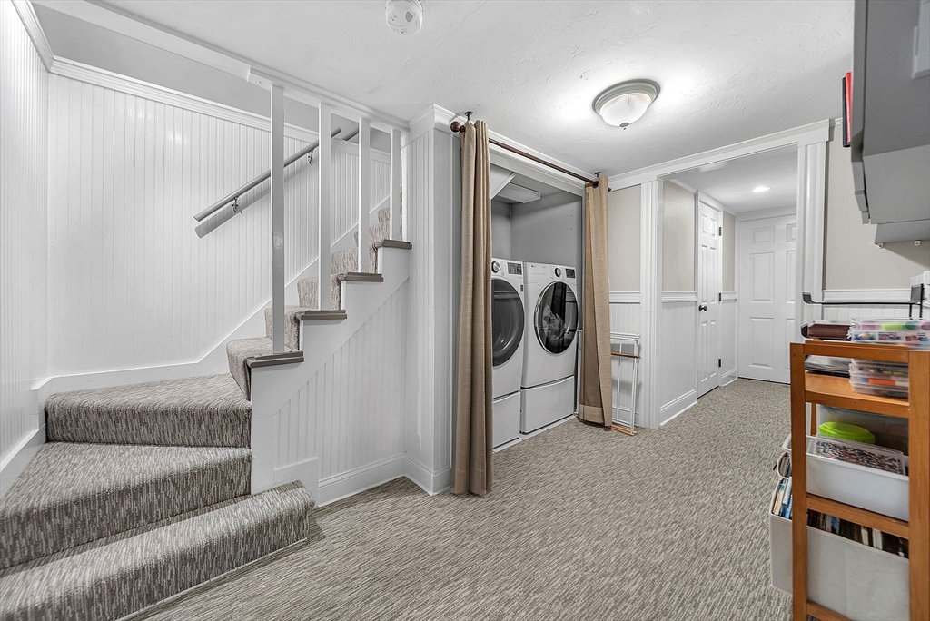 3 Thorpe Road Needham, MA 02494 - Photo 28 of 36 a view of a hallway with closet and a rug