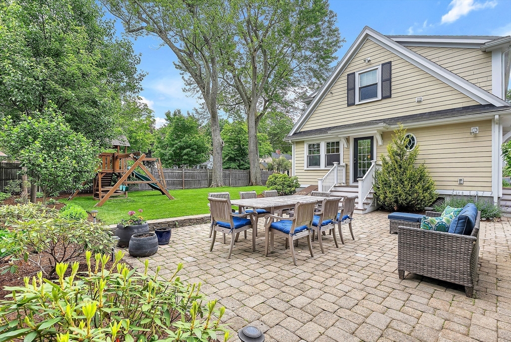 3 Thorpe Road Needham, MA 02494 - Photo 32 of 36 a view of a house with backyard sitting area and garden