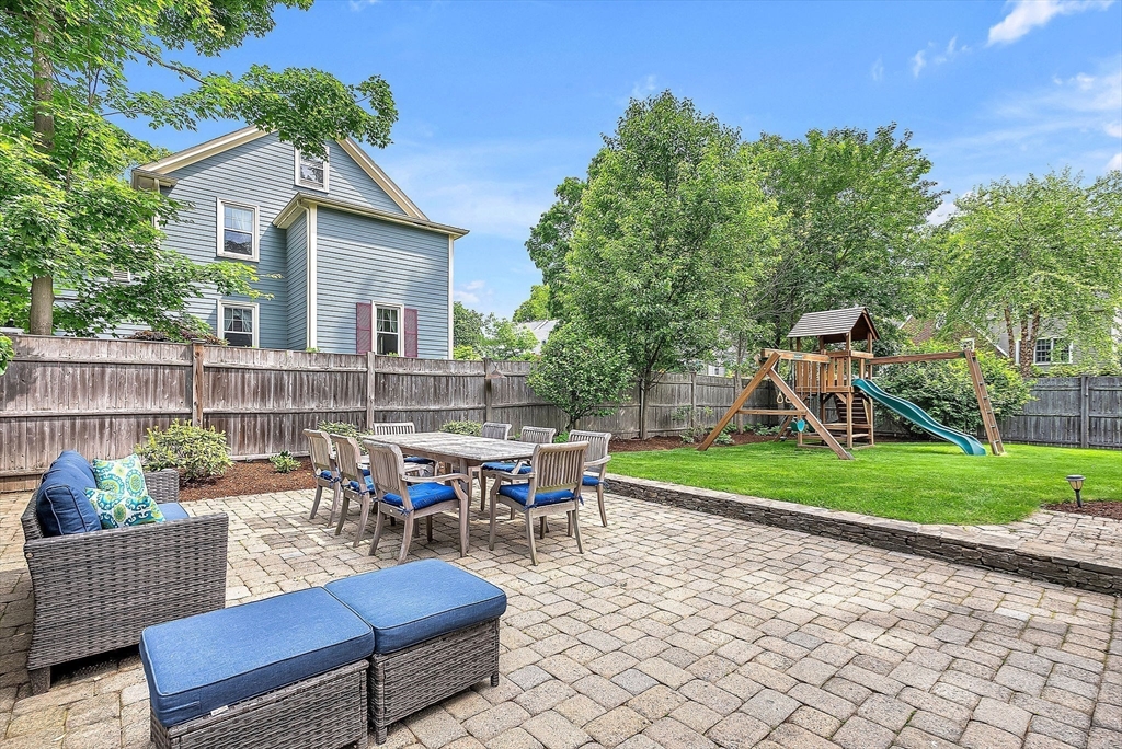 3 Thorpe Road Needham, MA 02494 - Photo 33 of 36 a view of a house and chair and table in the patio