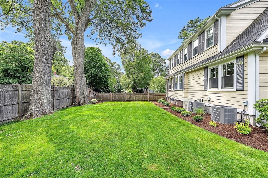 3 Thorpe Road Needham, MA 02494 - Photo 34 of 36 a view of a house with backyard and a tree