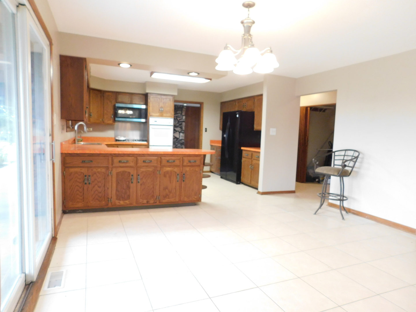 46W356 Jericho Road Big Rock, IL 60511 - Photo 11 of 33 a large room with chandelier fan and a view of living room