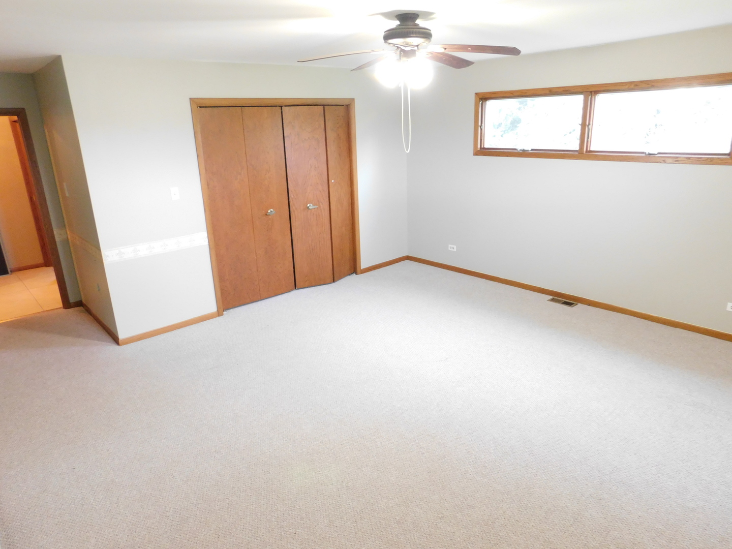 46W356 Jericho Road Big Rock, IL 60511 - Photo 23 of 33 an empty room with windows and fan