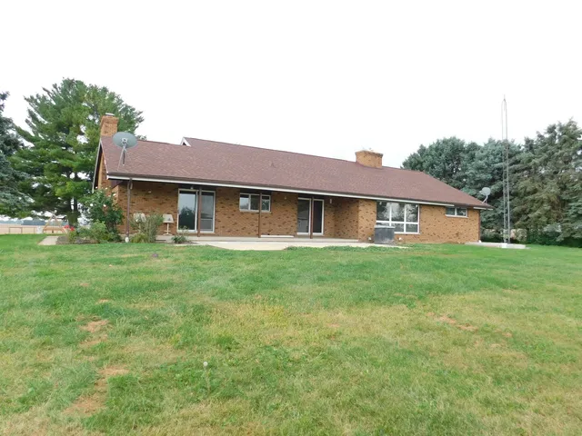 a front view of house with garden