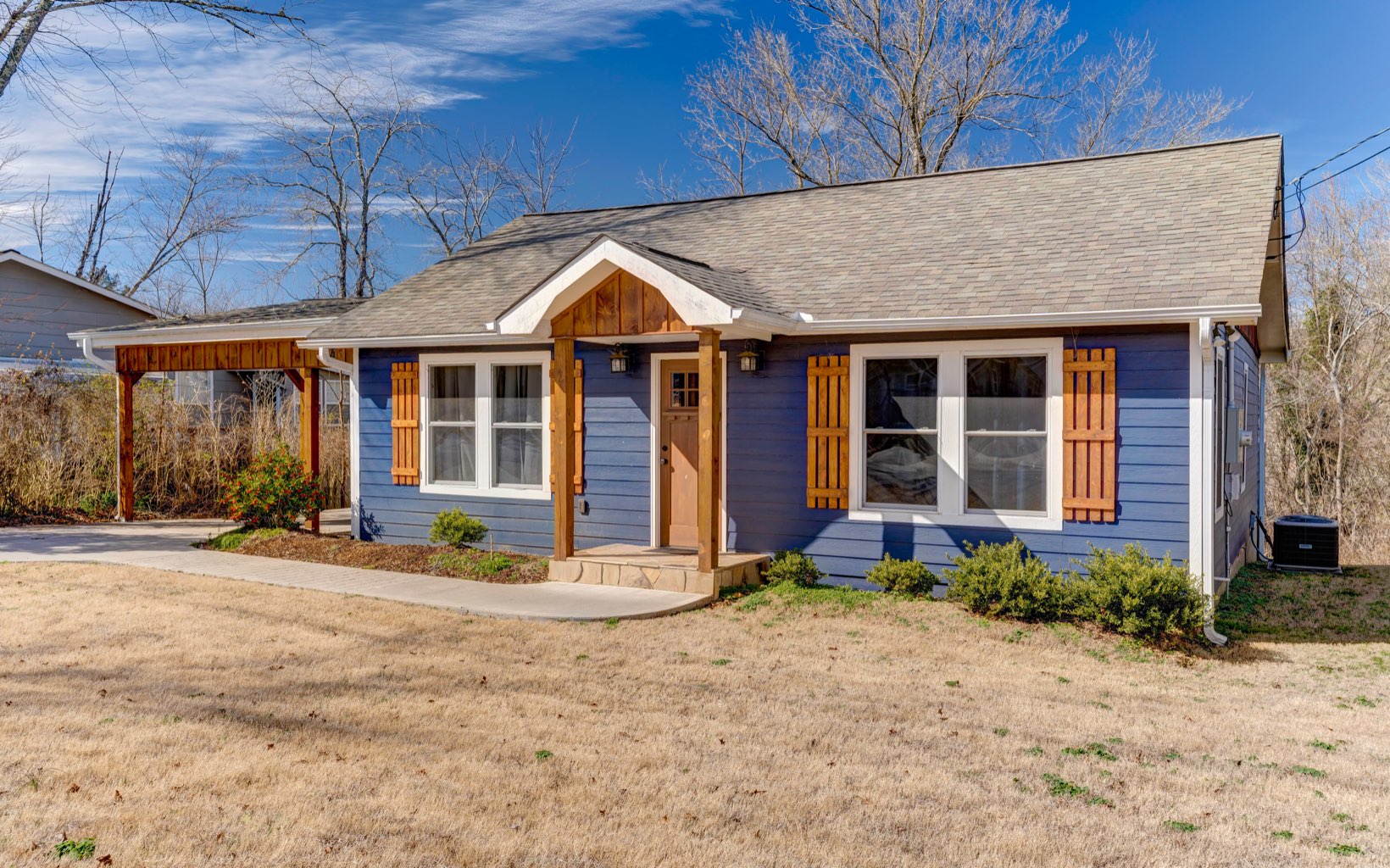656 East 2nd Street Blue Ridge, GA 30513 - Photo 1 of 1 a front view of a house with a yard