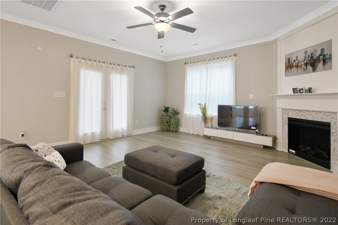 36 Spruce Hollow Circle Spring Lake, NC 28390 - Photo 19 of 49 a living room with furniture and a fireplace
