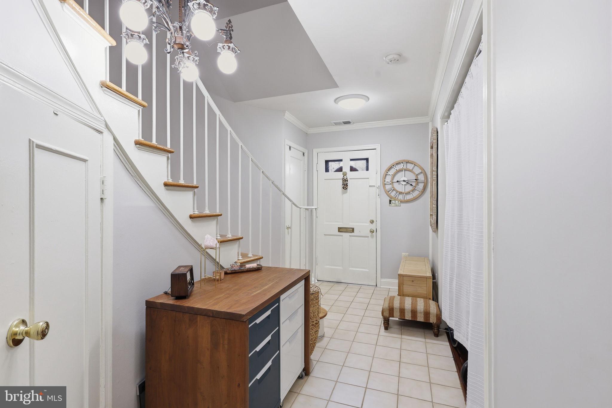 8222 Carrleigh Parkway, Unit 12 Springfield, VA 22152 - Photo 14 of 22 a view of entryway with furniture and wooden floor
