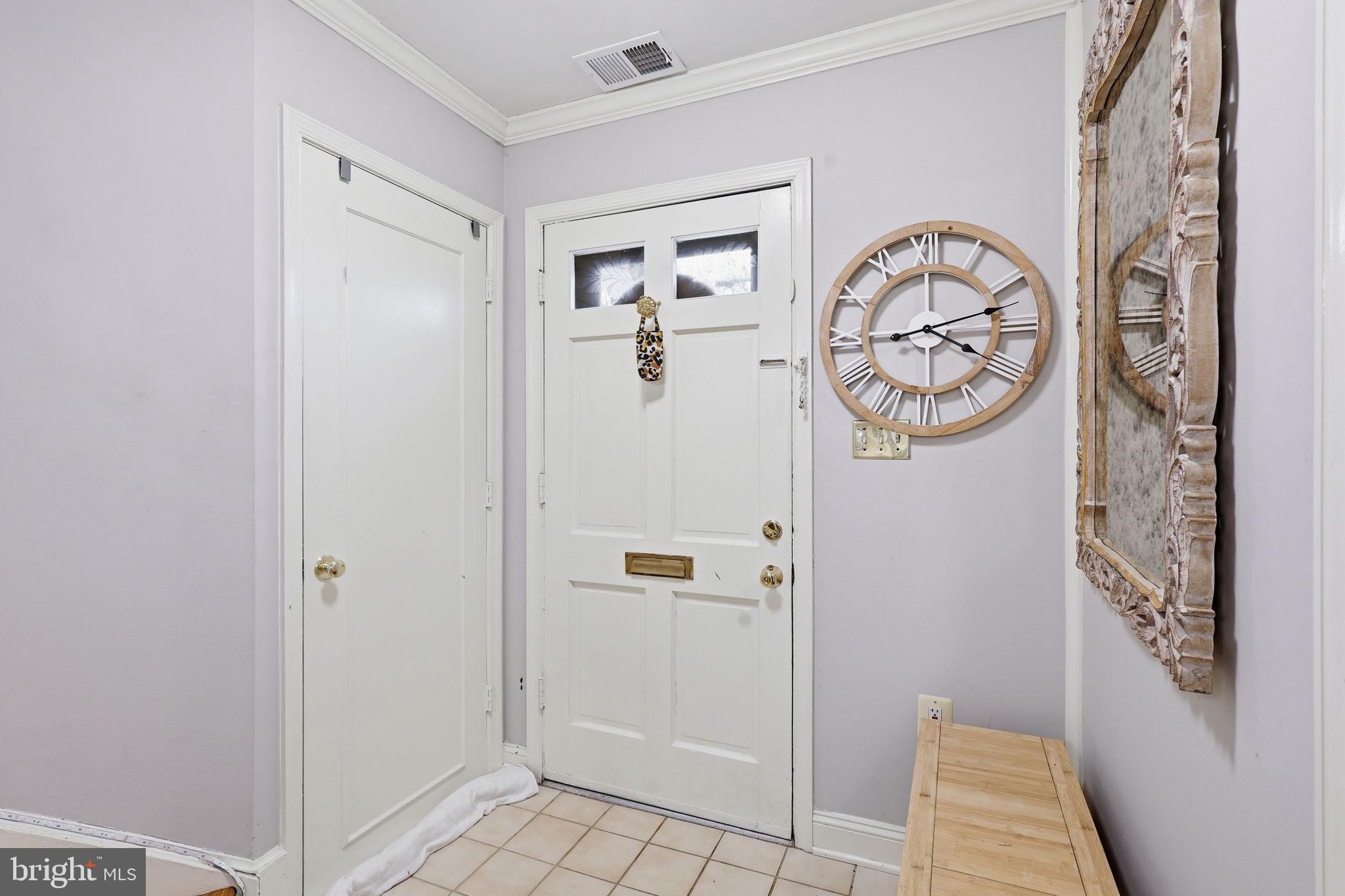 8222 Carrleigh Parkway, Unit 12 Springfield, VA 22152 - Photo 3 of 22 a view of a hallway with elevator
