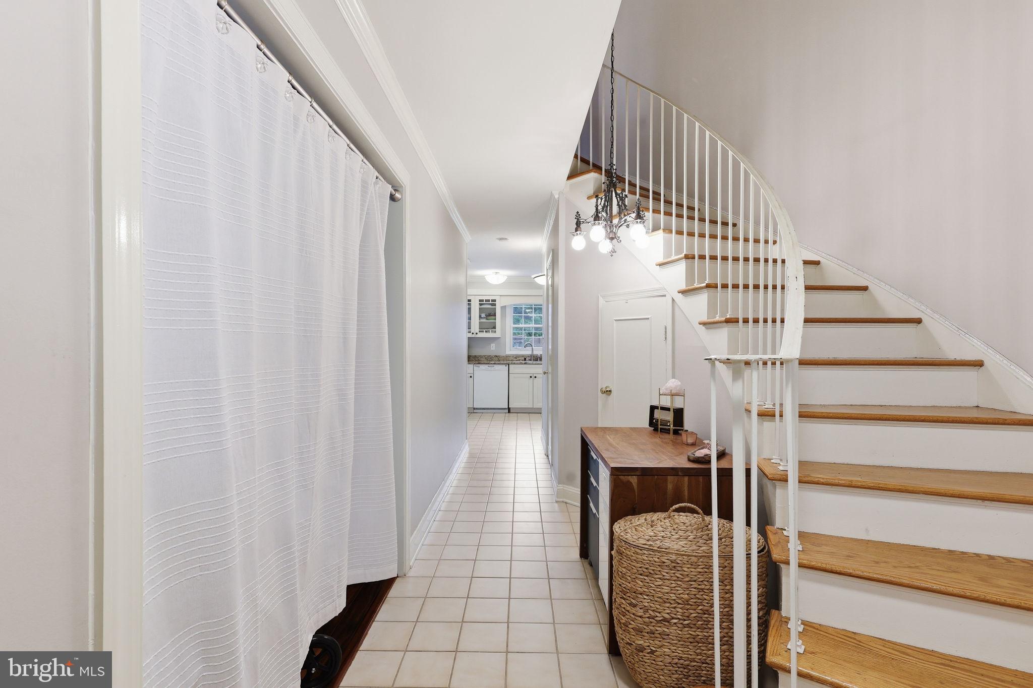 8222 Carrleigh Parkway, Unit 12 Springfield, VA 22152 - Photo 4 of 22 a view of a hallway with staircase