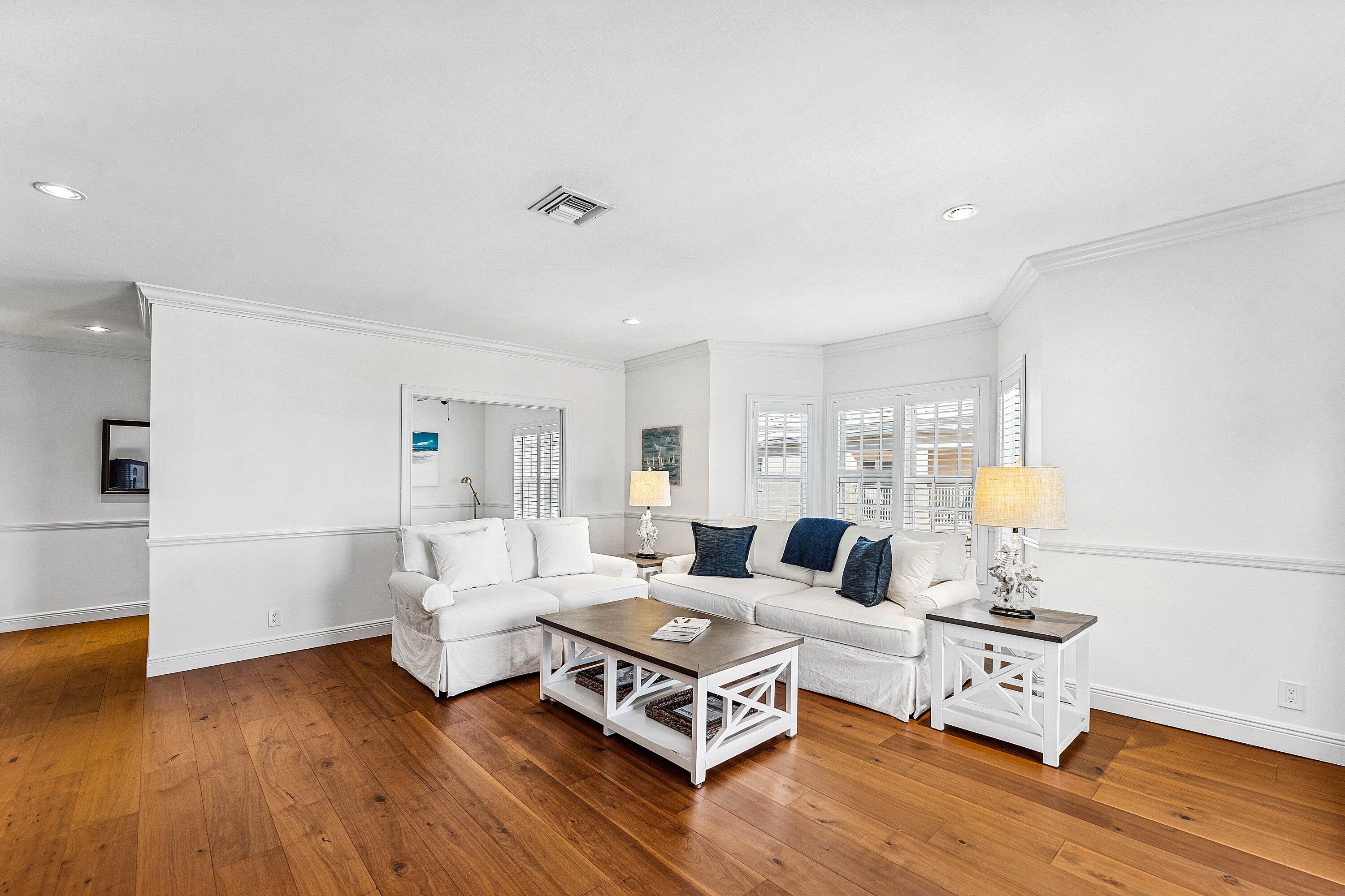 5900 Old Ocean Boulevard, Unit C4 Ocean Ridge, FL 33435 - Photo 15 of 25 a living room with furniture and a wooden floor