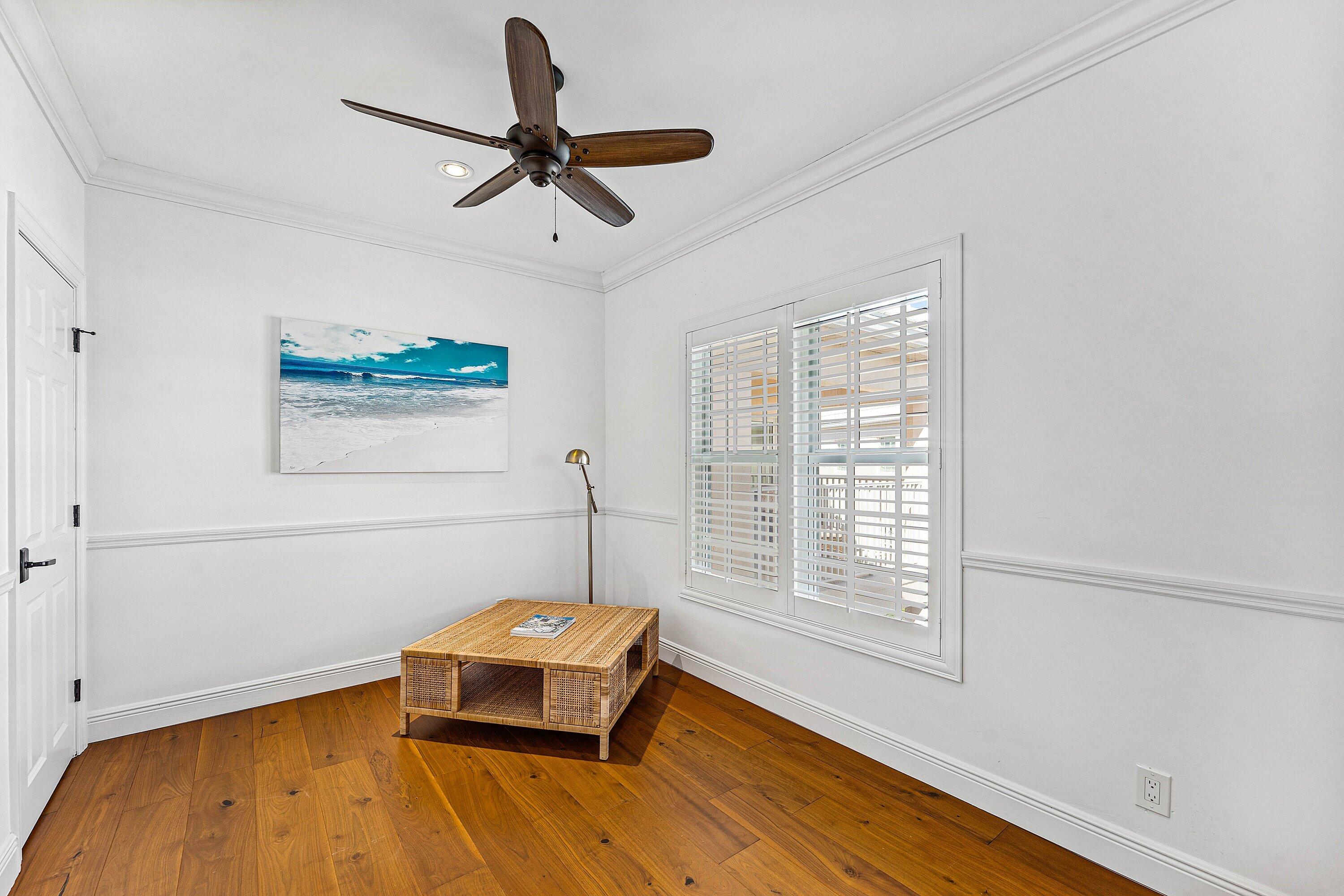 5900 Old Ocean Boulevard, Unit C4 Ocean Ridge, FL 33435 - Photo 16 of 25 a bedroom with a bed and a window