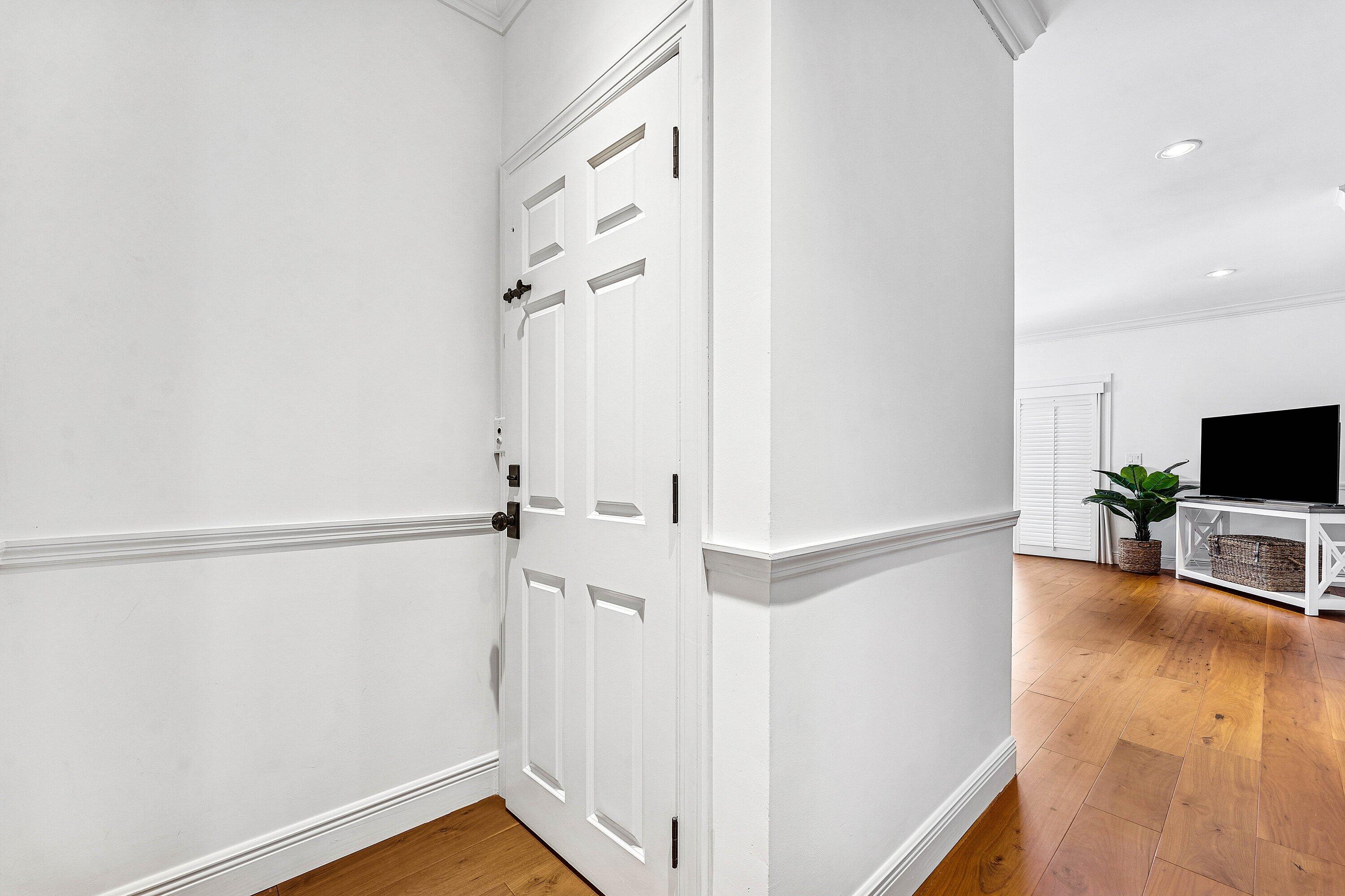 5900 Old Ocean Boulevard, Unit C4 Ocean Ridge, FL 33435 - Photo 17 of 25 a view of a livingroom with wooden floor