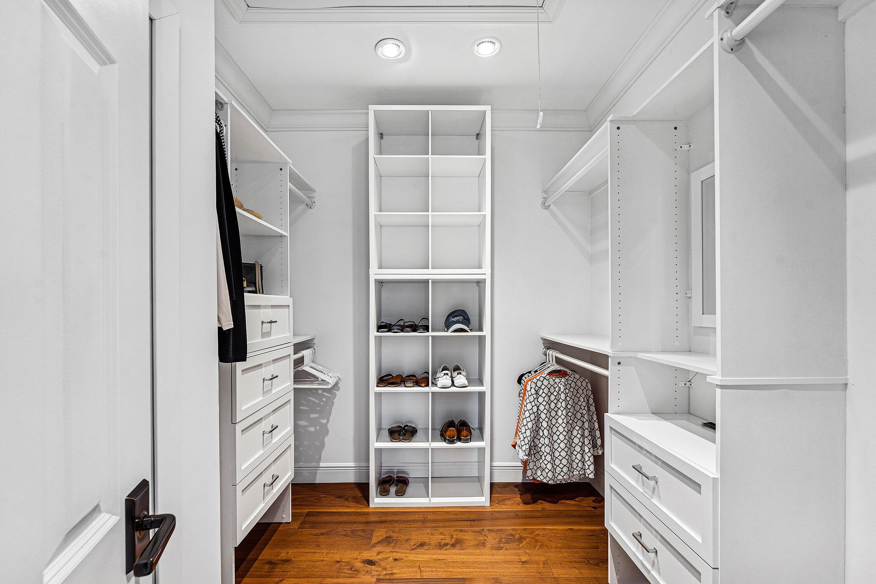 5900 Old Ocean Boulevard, Unit C4 Ocean Ridge, FL 33435 - Photo 22 of 25 a view of walk in closet with clothes and shoes