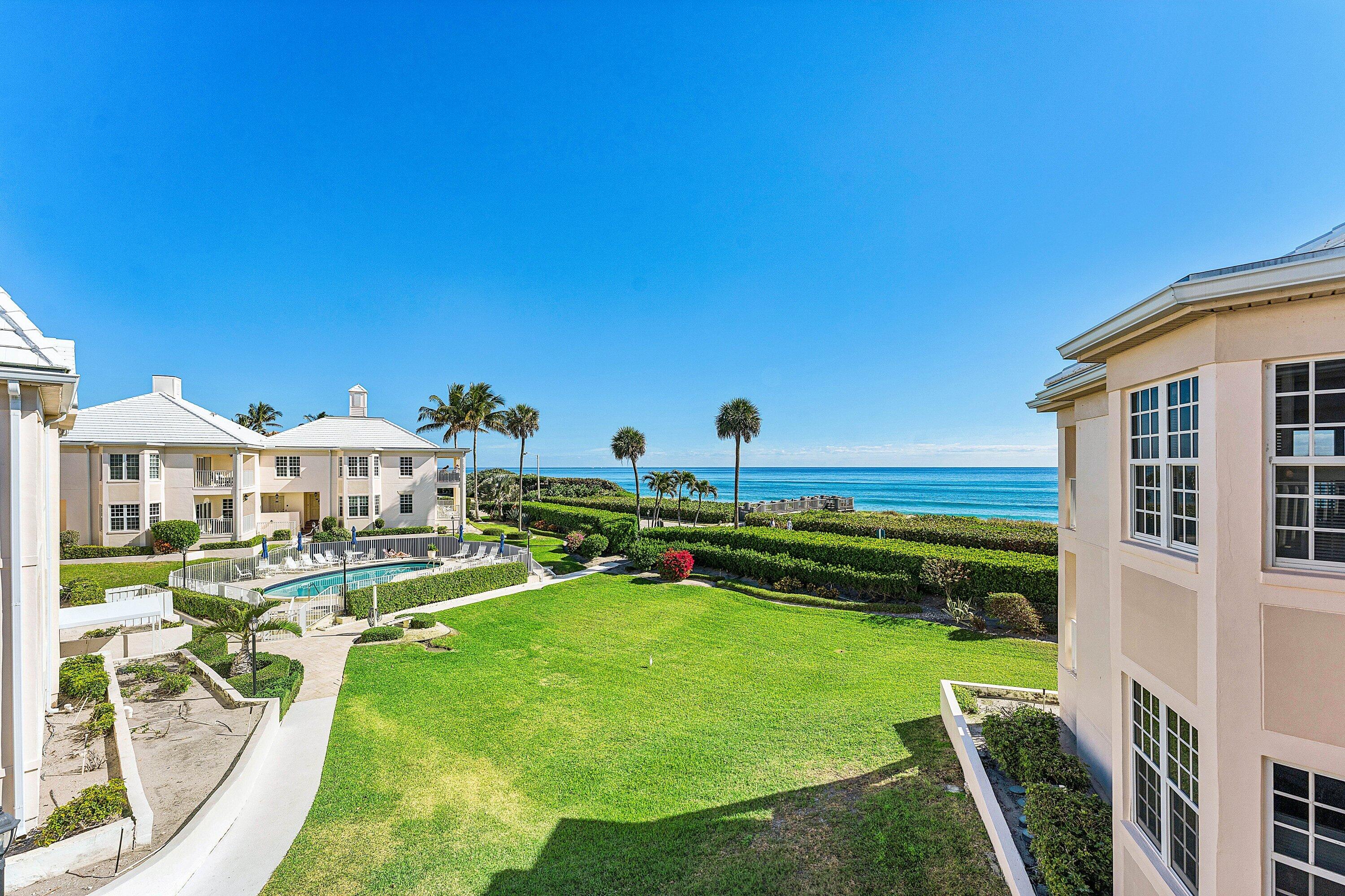 5900 Old Ocean Boulevard, Unit C4 Ocean Ridge, FL 33435 - Photo 3 of 25 a view of an house with backyard space and sitting area