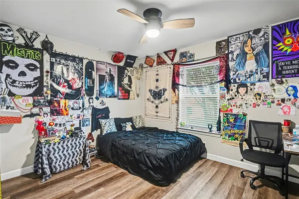 a bedroom with furniture and a bed