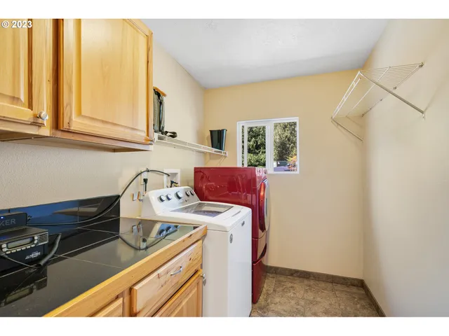 a bed room with a bed and a dresser