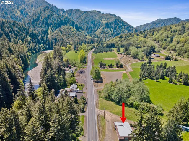 an aerial view of a house with a garden