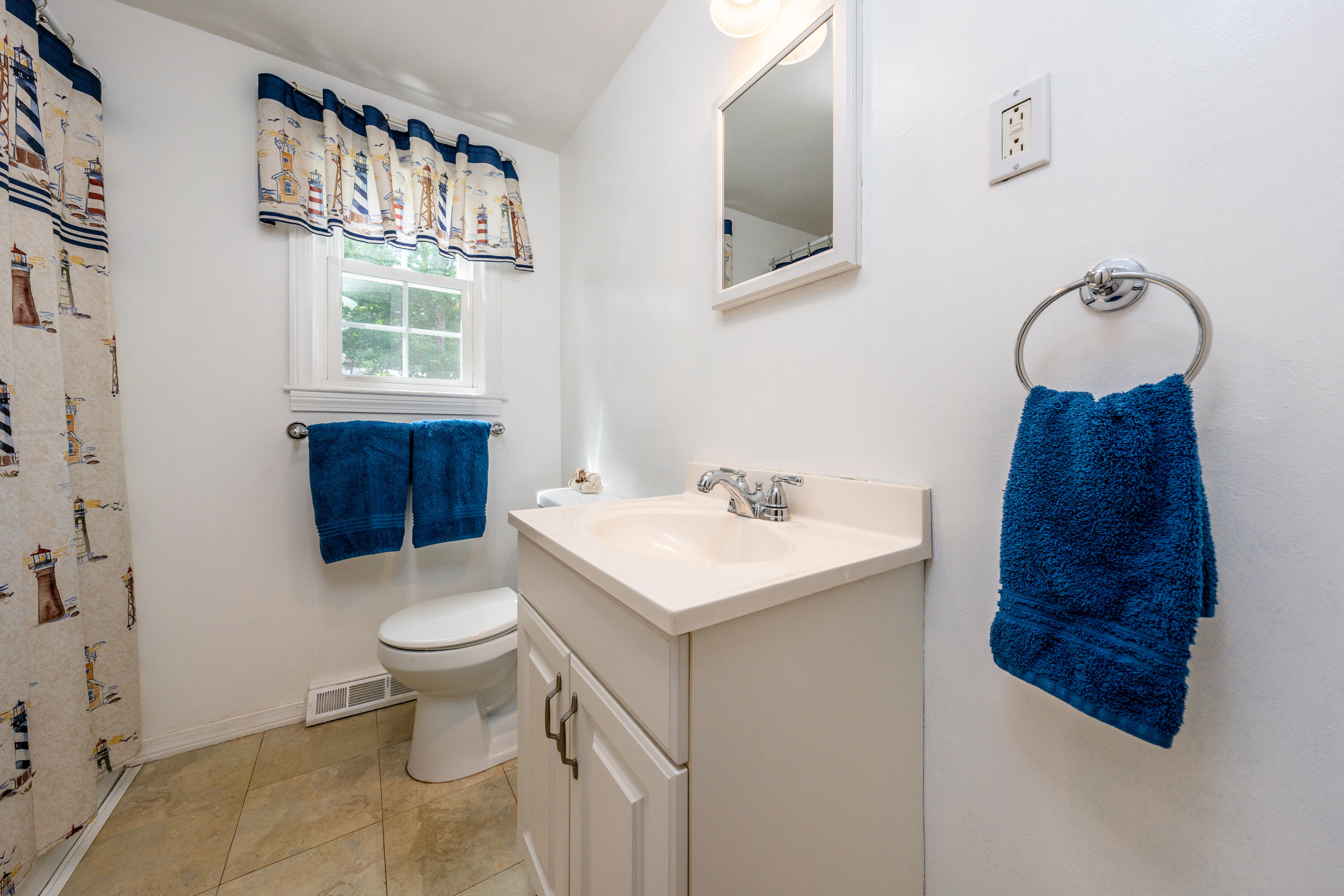 51 Pram Road Hyannis, MA 02601 - Photo 11 of 12 a bathroom with a sink toilet and mirror