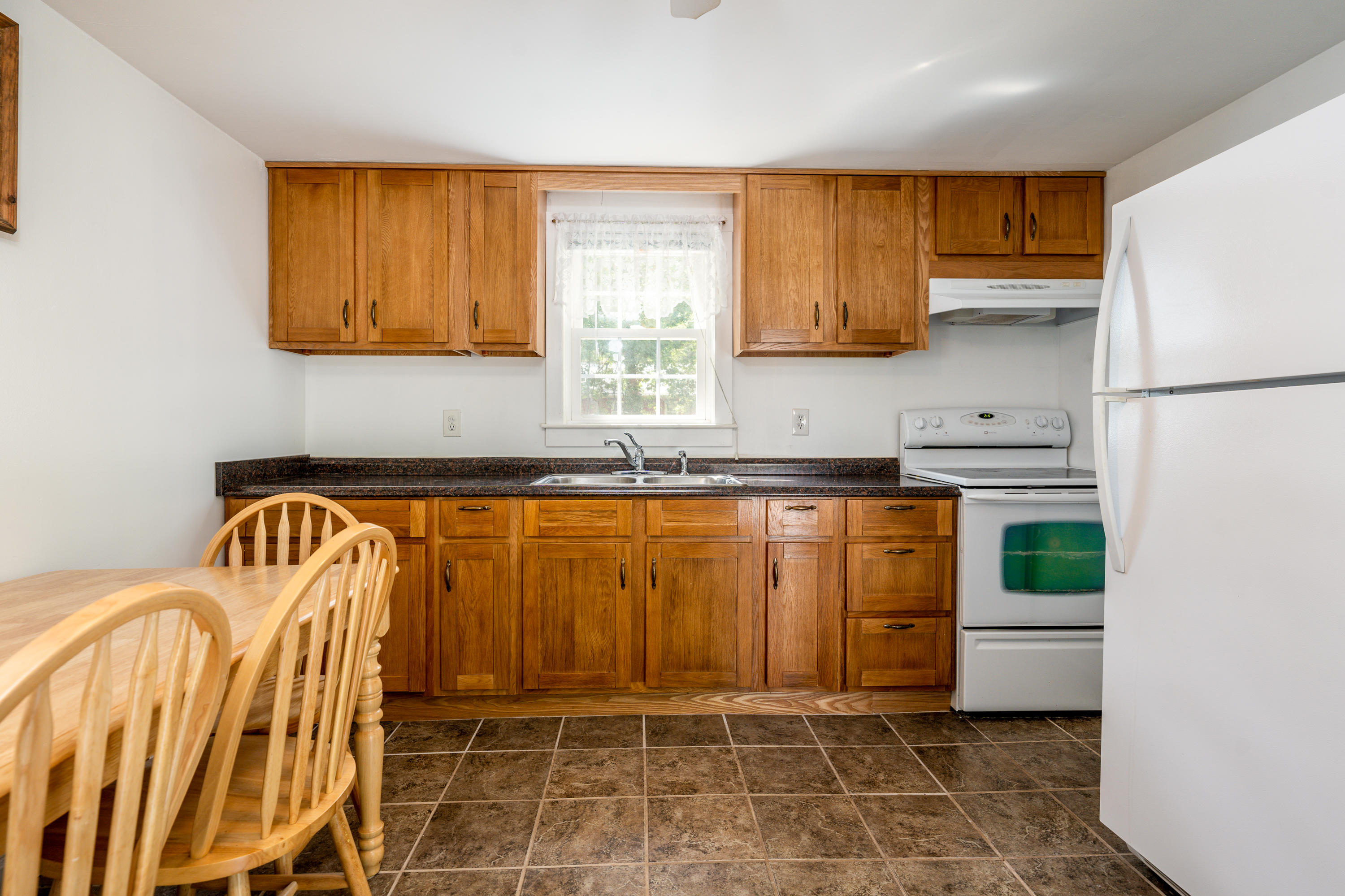51 Pram Road Hyannis, MA 02601 - Photo 5 of 12 a bathroom with a tub a sink and a window