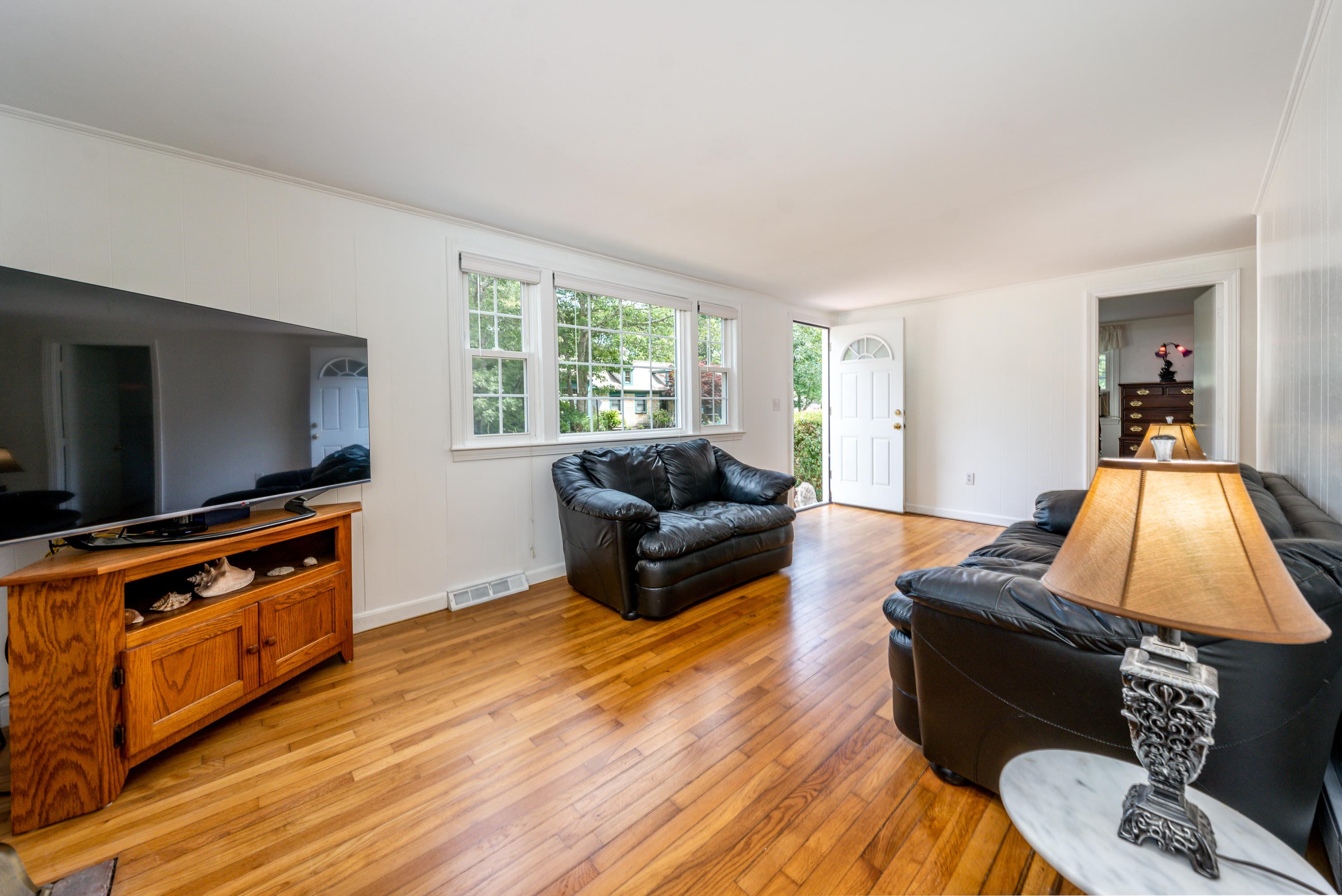 51 Pram Road Hyannis, MA 02601 - Photo 6 of 12 a living room with furniture and a flat screen tv