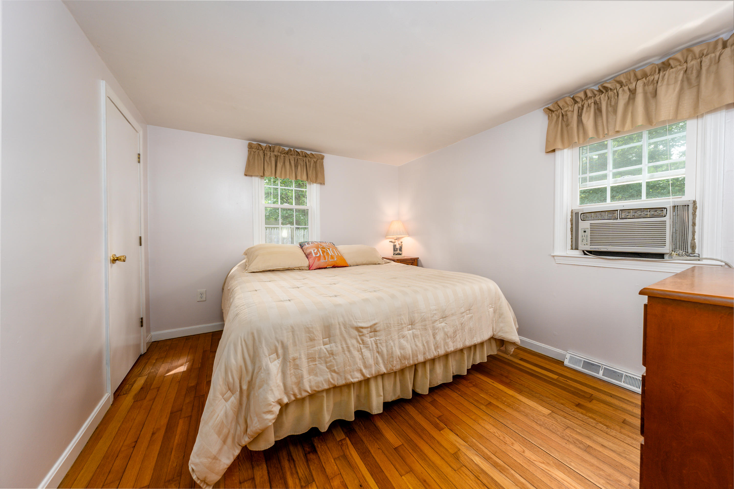 51 Pram Road Hyannis, MA 02601 - Photo 10 of 12 a bedroom with a bed and a window