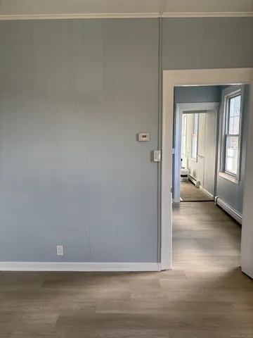 a view of livingroom with hardwood floor and window