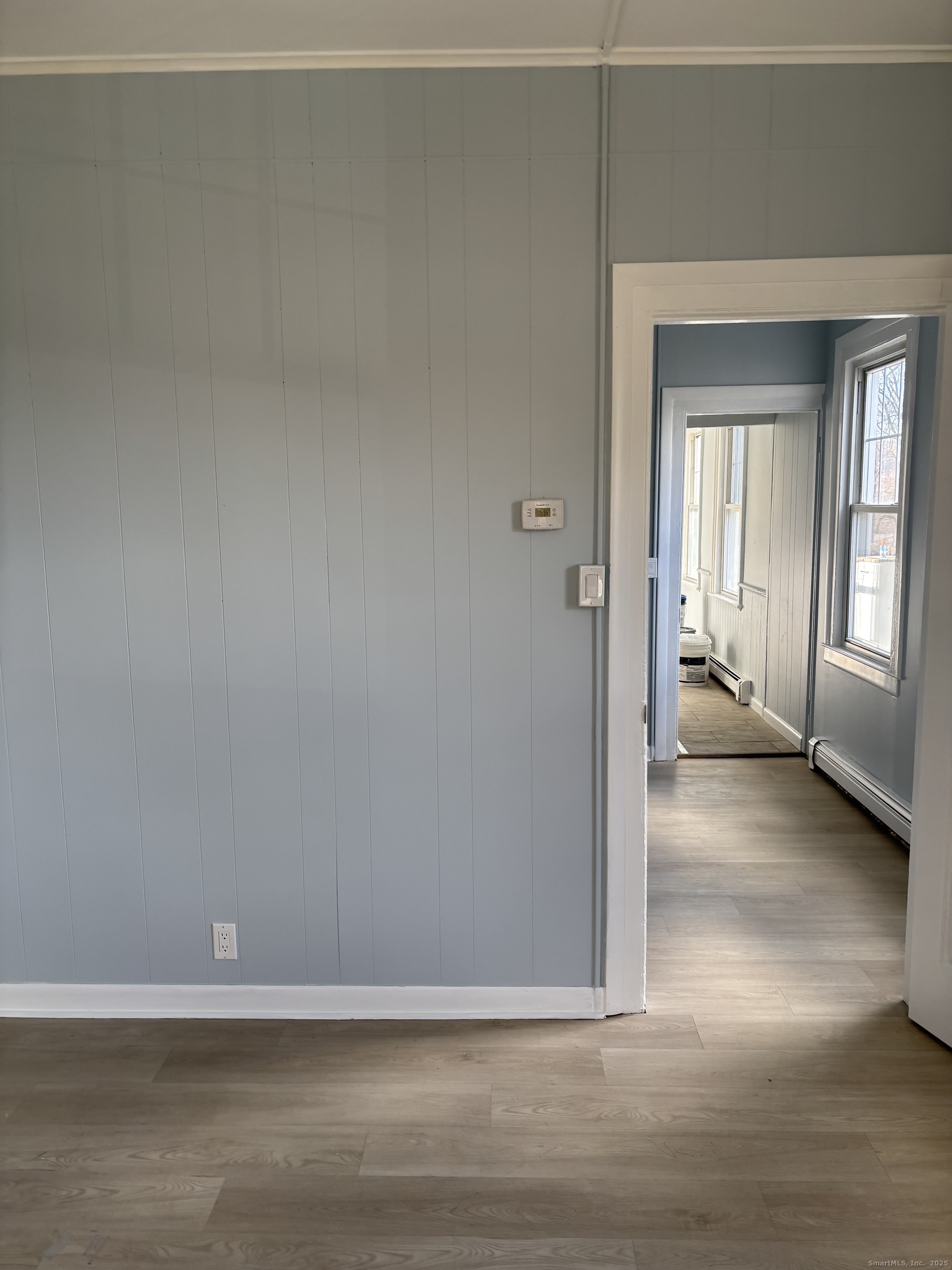 35 Washington Street Naugatuck, CT 06770 - Photo 11 of 16 a view of livingroom with hardwood floor and window