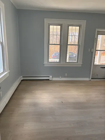 an empty room with windows