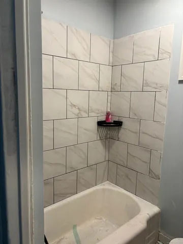 a bathroom with a bathtub