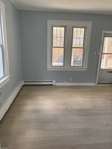 an empty room with windows