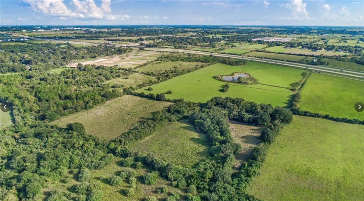 45110 Frontage Tract 1 Rd Prairie View Prairie View, TX 77445 - Photo 4 of 7 a view of a lake with a mountain