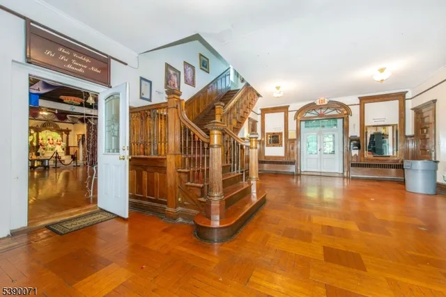 a view of an entryway with a hall