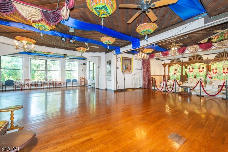 100 Jacksonville Road, Unit 10 Montville, NJ 07082 - Photo 9 of 18 a view of swimming pool with outdoor seating space and wooden floor
