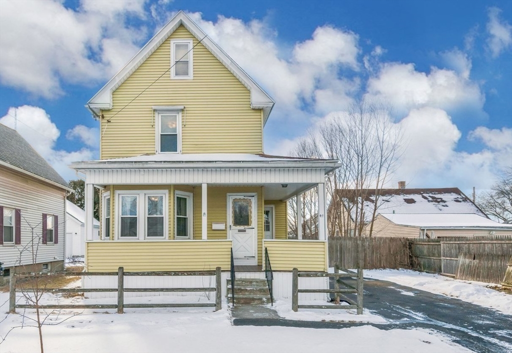 41 Briggs Street Springfield, MA 01151 - Photo 1 of 30 a front view of a house with a yard