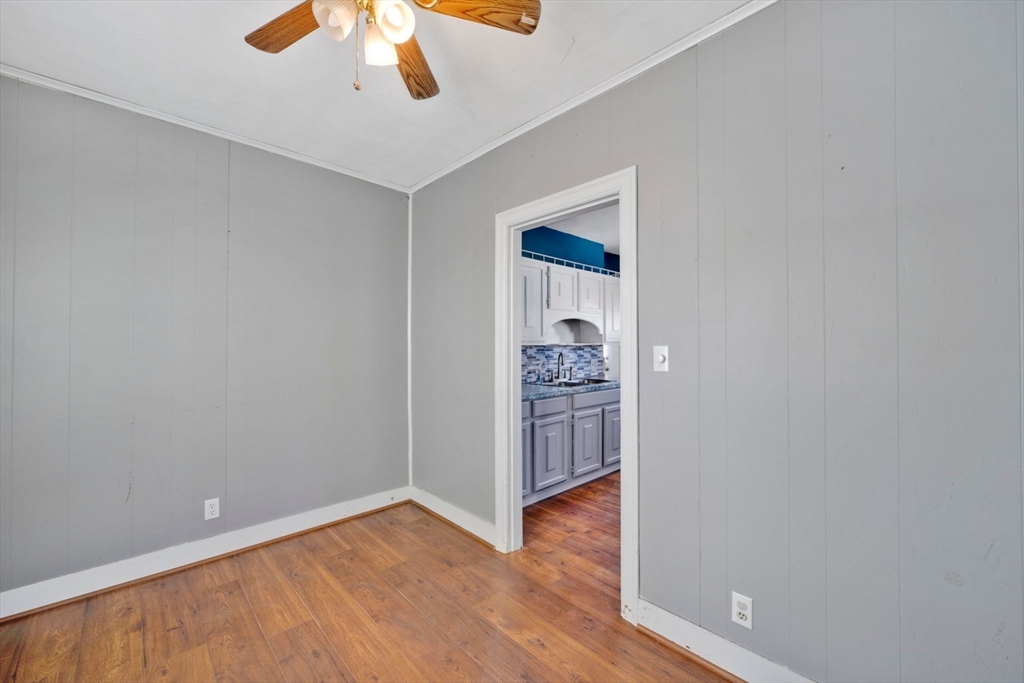 41 Briggs Street Springfield, MA 01151 - Photo 11 of 30 wooden floor in an empty room