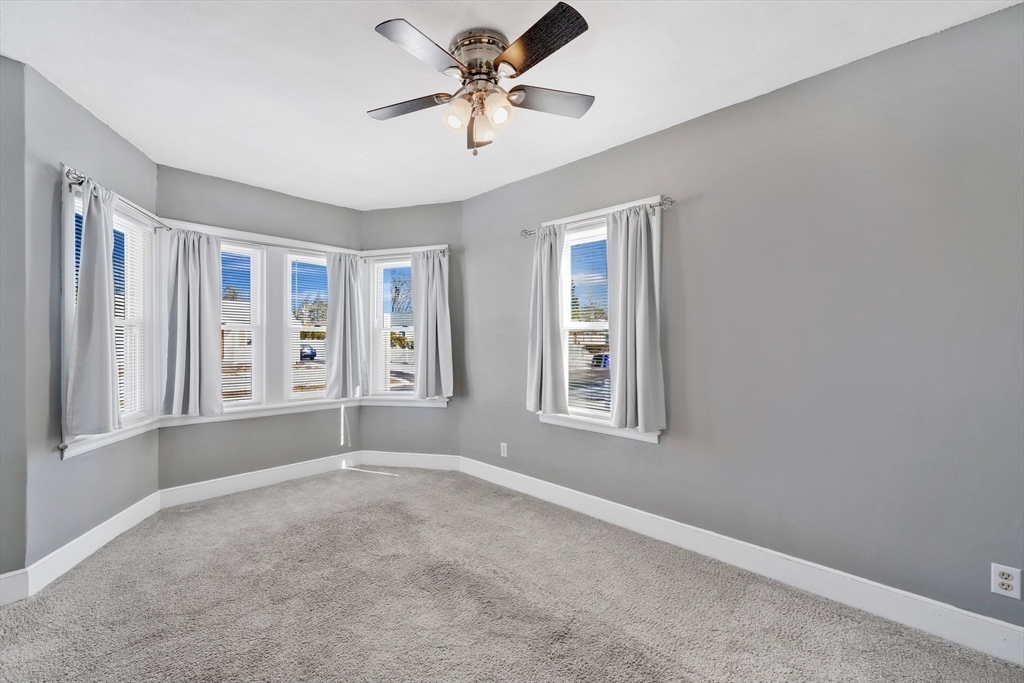 41 Briggs Street Springfield, MA 01151 - Photo 12 of 30 a view of an empty room with a window