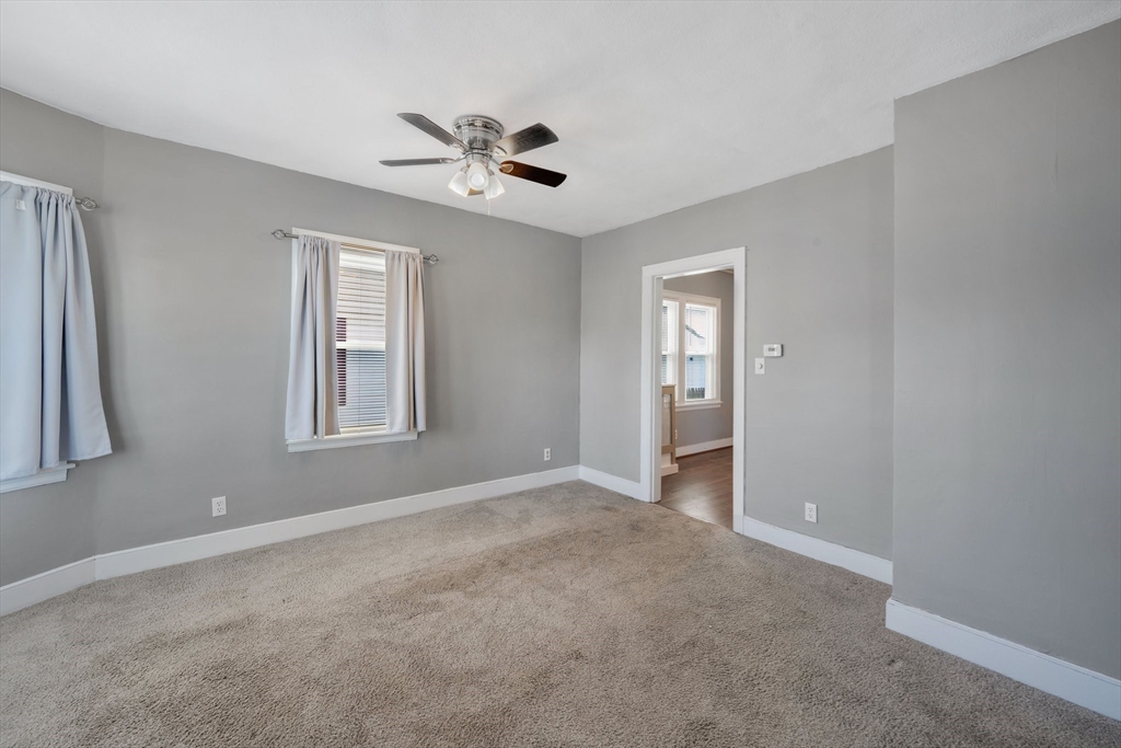 41 Briggs Street Springfield, MA 01151 - Photo 15 of 30 a view of an empty room with a window