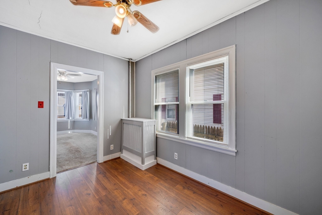 41 Briggs Street Springfield, MA 01151 - Photo 8 of 30 a view of livingroom with furniture wooden floor and window