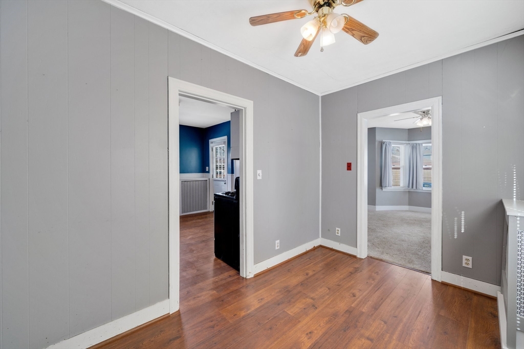 41 Briggs Street Springfield, MA 01151 - Photo 9 of 30 wooden floor in a room with a window