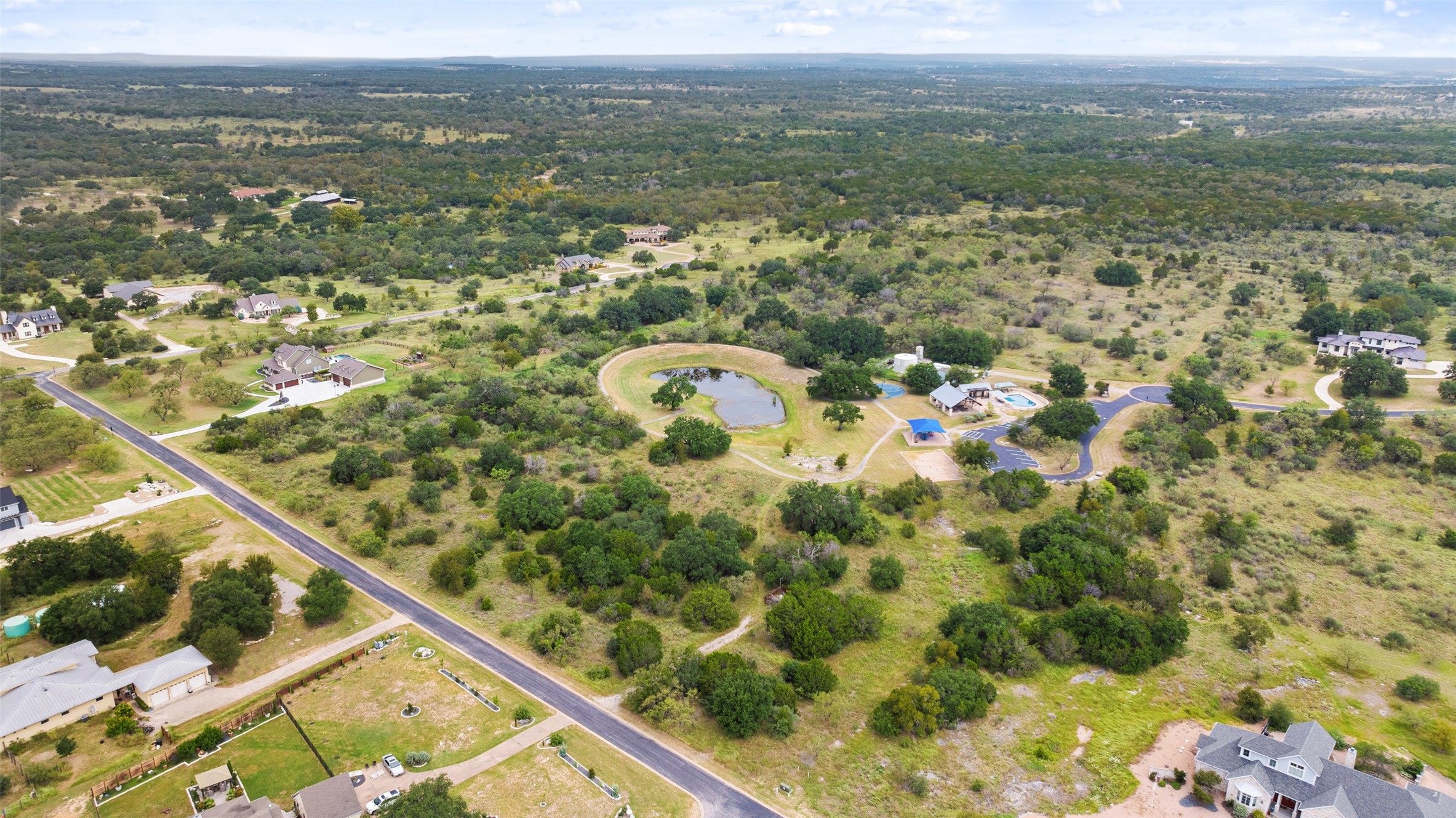 108 Cross Trail Spicewood, TX 78669 - Photo 12 of 33 a view of a city with an outdoor space