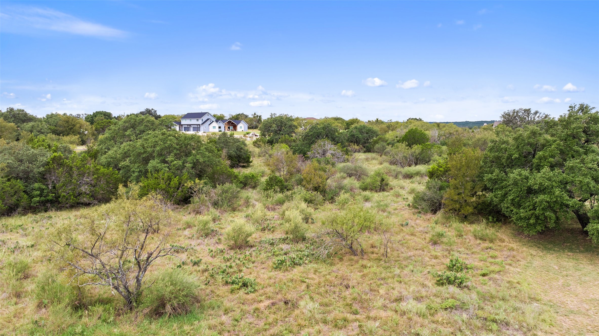108 Cross Trail Spicewood, TX 78669 - Photo 9 of 33 a view of a bunch of trees