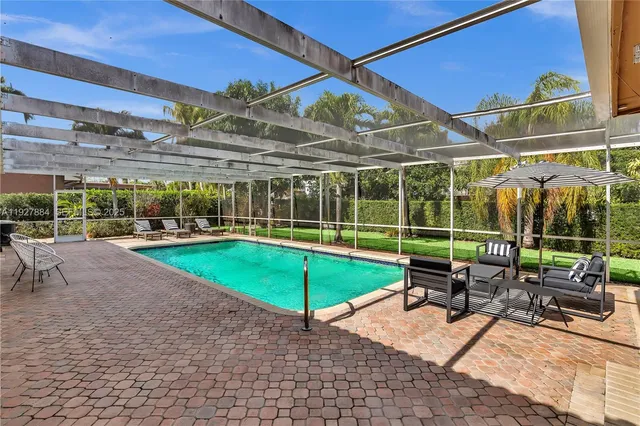 a view of a backyard with a patio