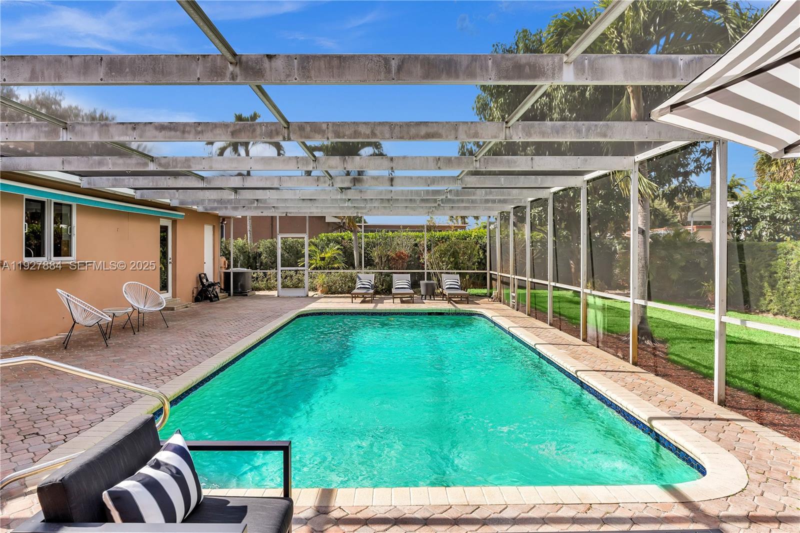 3437 Buchanan Street Hollywood, FL 33021 - Photo 23 of 40 a view of a backyard with a patio