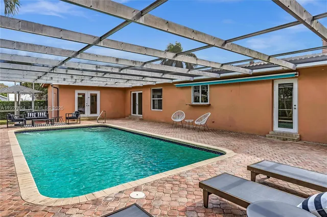a view of a backyard with a patio