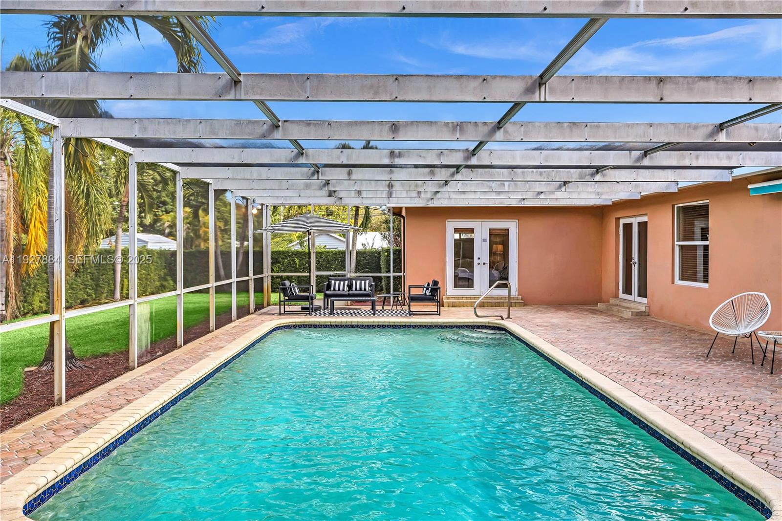 3437 Buchanan Street Hollywood, FL 33021 - Photo 27 of 40 a view of swimming pool with a backyard