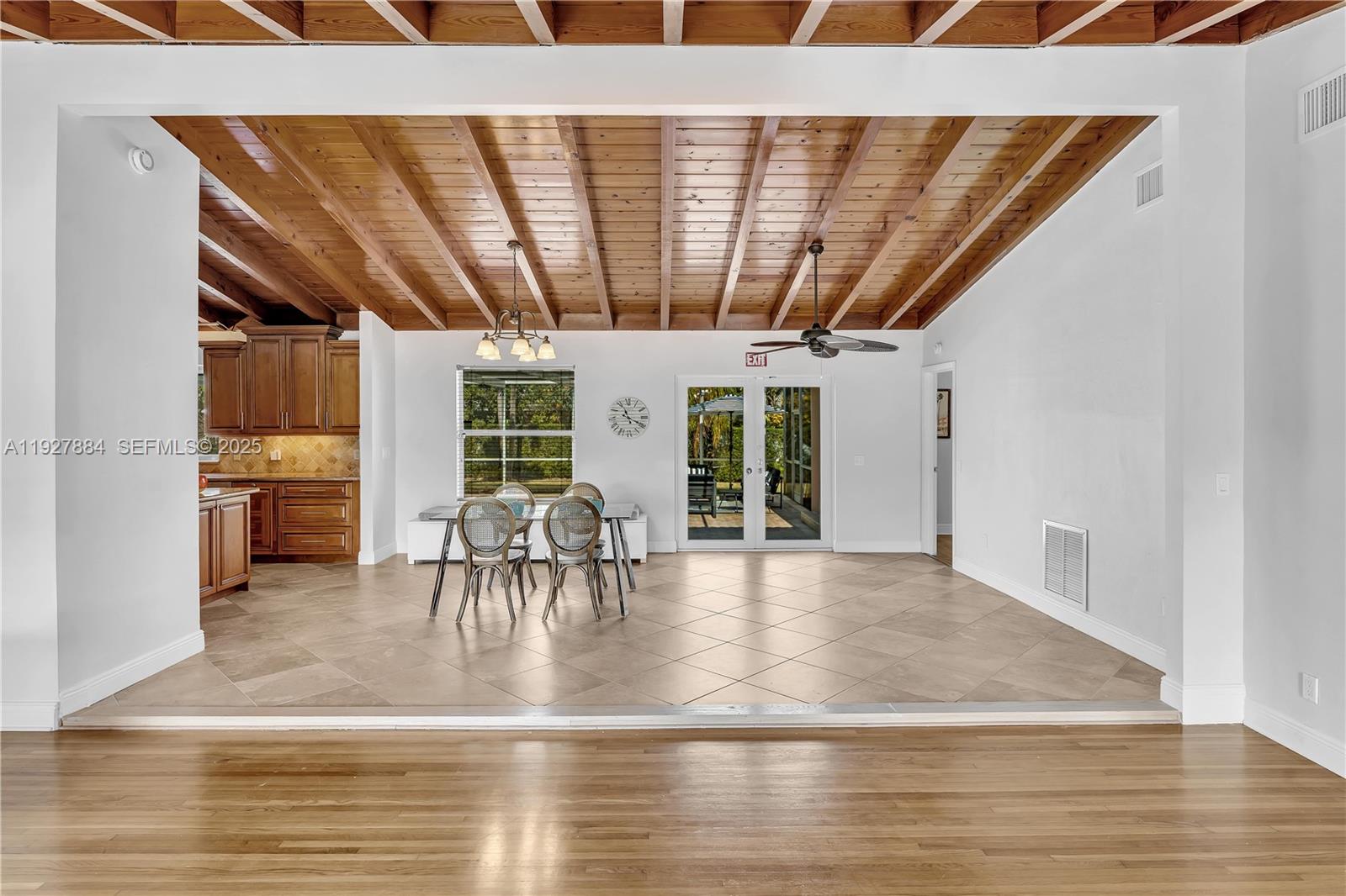 3437 Buchanan Street Hollywood, FL 33021 - Photo 6 of 40 a view of dining room with wooden floor