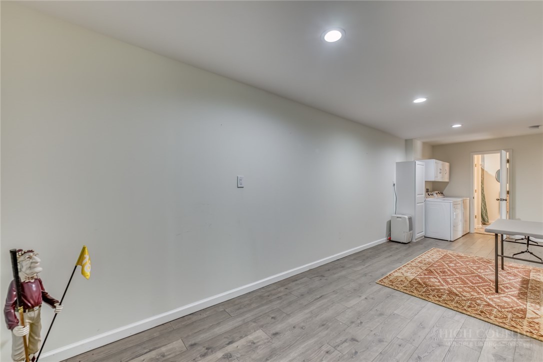 174 Spruce Pine Road Newland, NC 28657 - Photo 24 of 50 a view of a room with wooden floor and windows