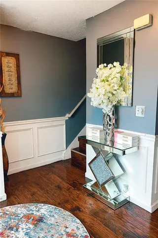 a vase of flowers sitting on a table