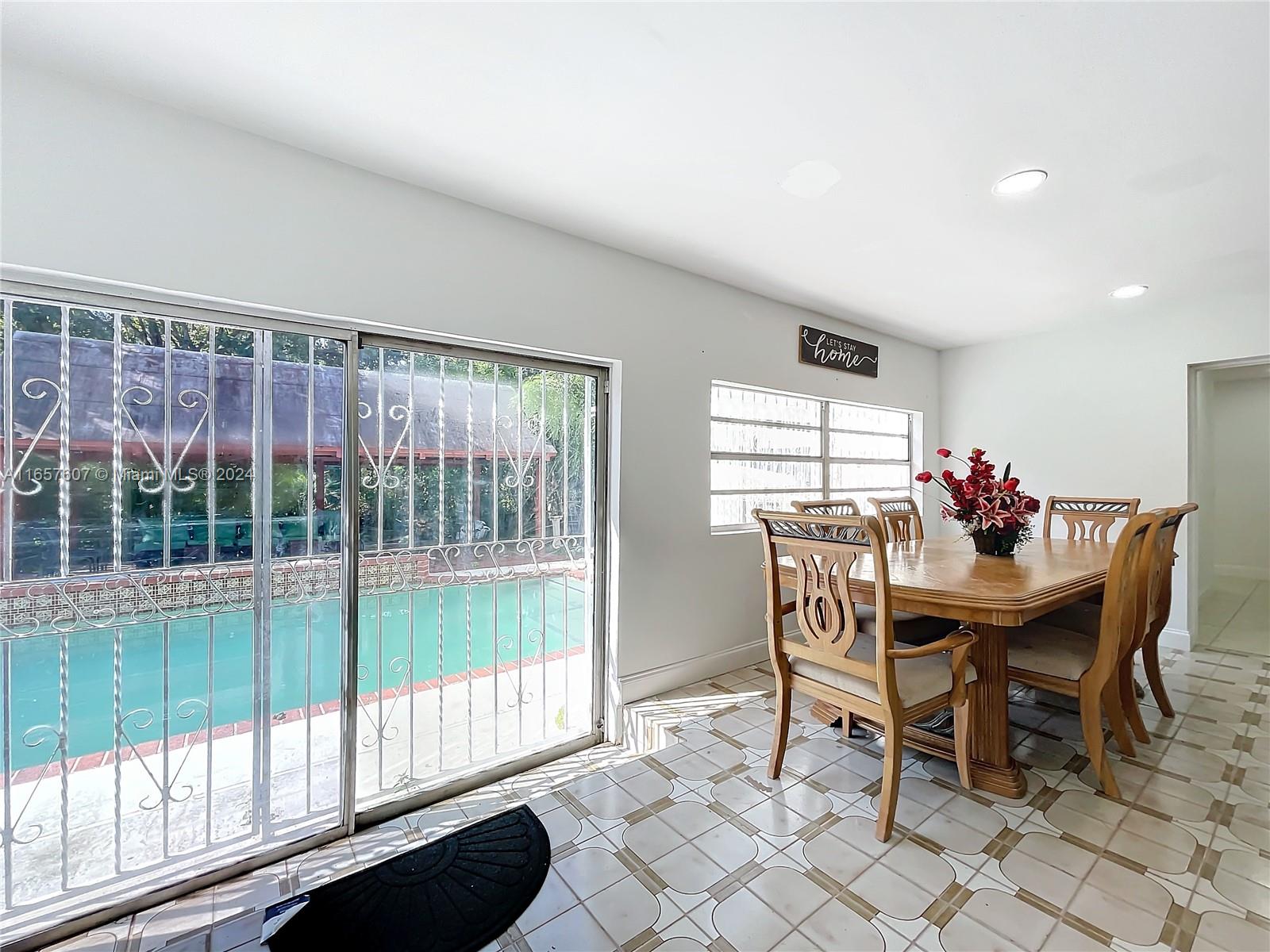 8218 Southampton Drive Miramar, FL 33025 - Photo 11 of 28 a dining room with furniture and window
