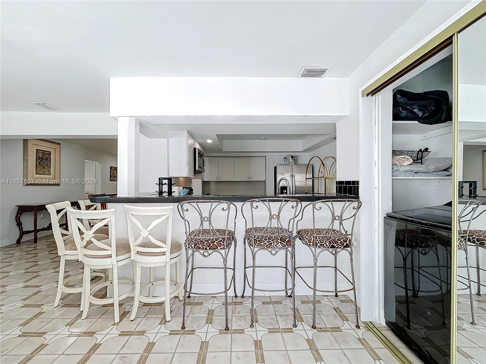 8218 Southampton Drive Miramar, FL 33025 - Photo 12 of 28 a view of a dining room with furniture