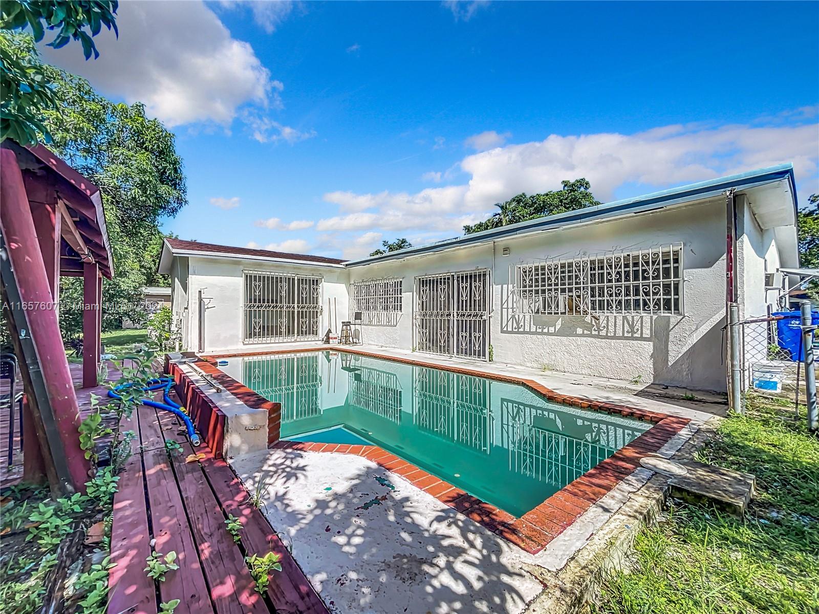 8218 Southampton Drive Miramar, FL 33025 - Photo 2 of 28 a view of an house with backyard space and balcony